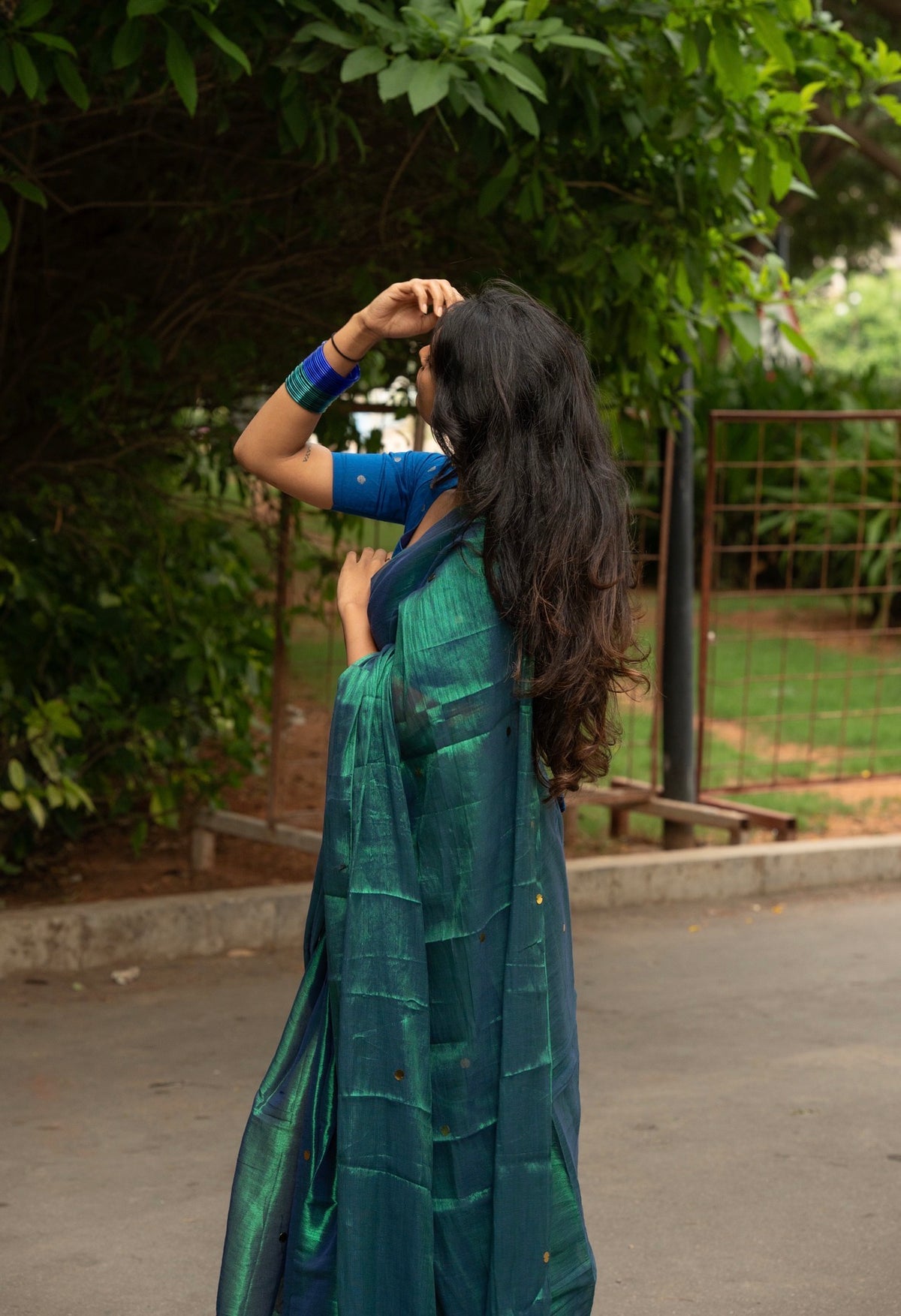 Model wearing handloom tissue silk saree for office wear