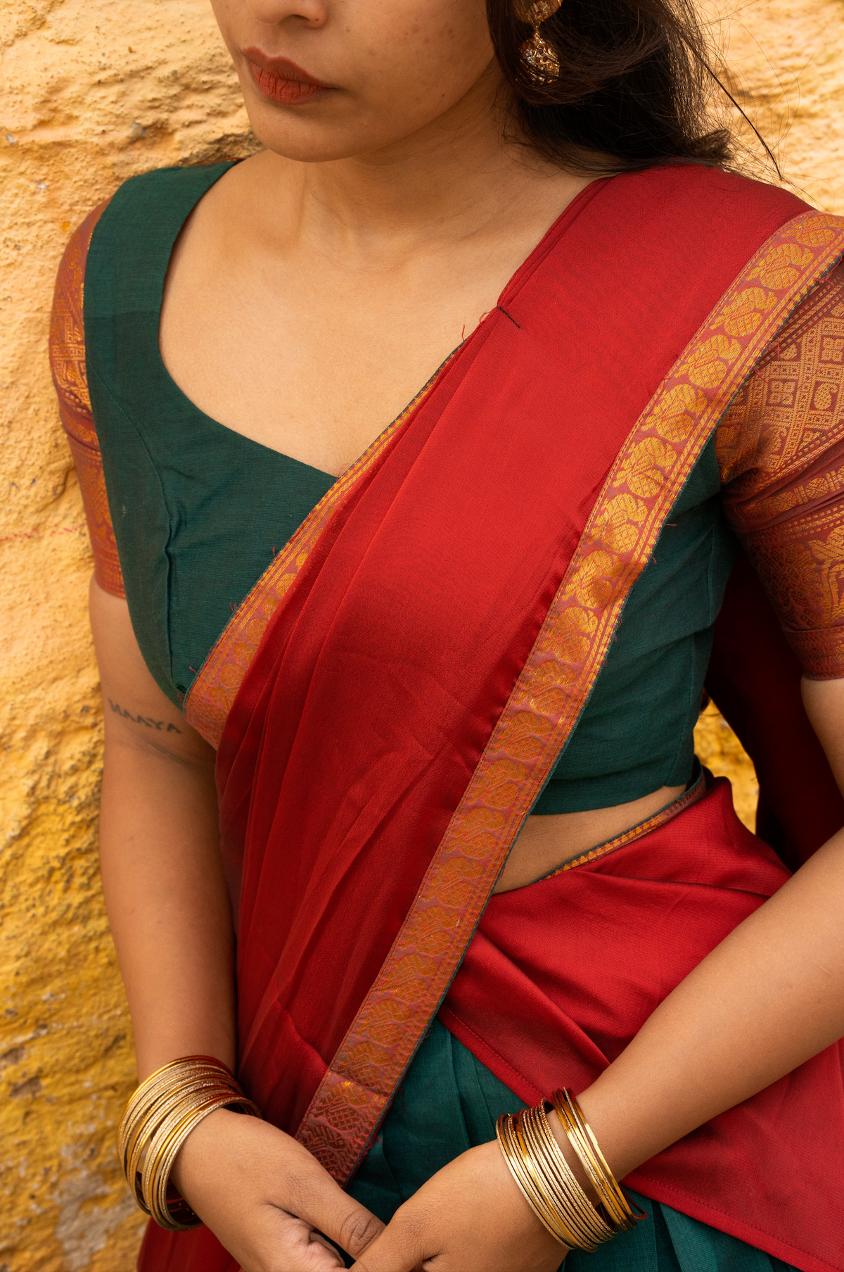 Rainbow dreams-Iconic red with green paavadai dhaavani set