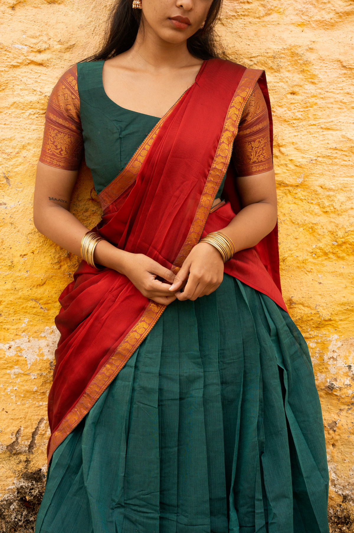Rainbow dreams-Iconic red with green paavadai dhaavani set