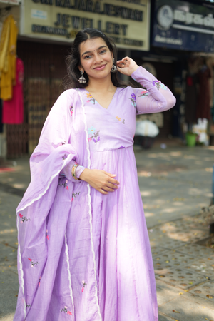 Designer violet Anarkali suit for women with embroidered detailing and a matching dupatta, perfect for festive occasions.