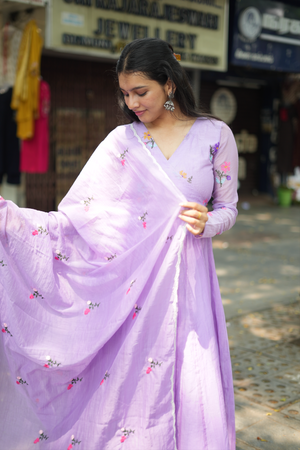 Women’s floral embroidered Anarkali dress with matching dupatta, showcasing a graceful silhouette and handcrafted detailing.