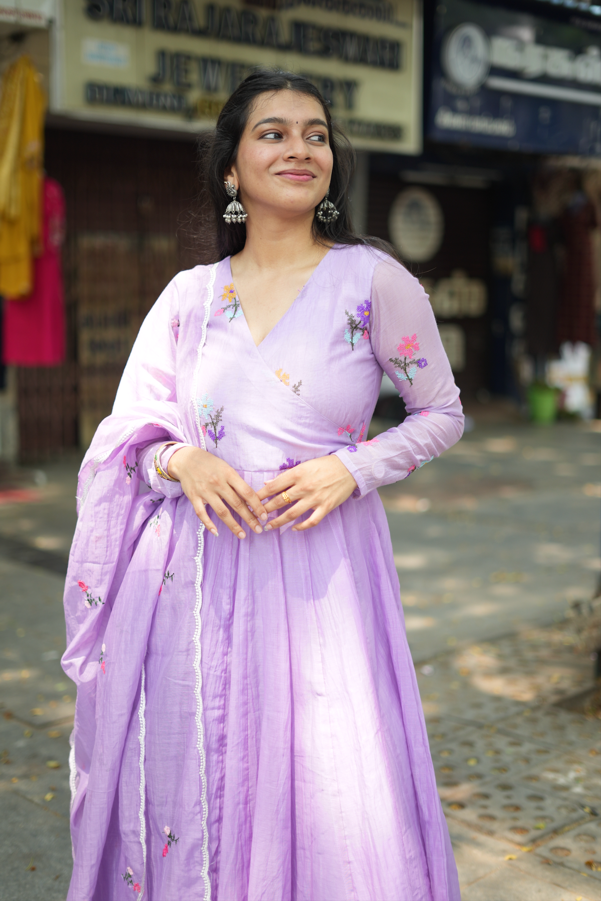 Anvi floral embroidered Anarkali dress in soft violet with matching dupatta, crafted from premium Mal Chanderi fabric.