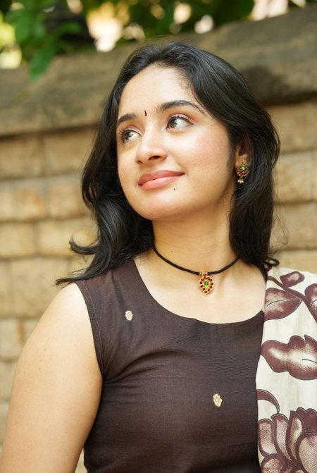 Coffee brown sleeveless Narayanpet kurta with elegant handloom festive styling and ethnic detailing
