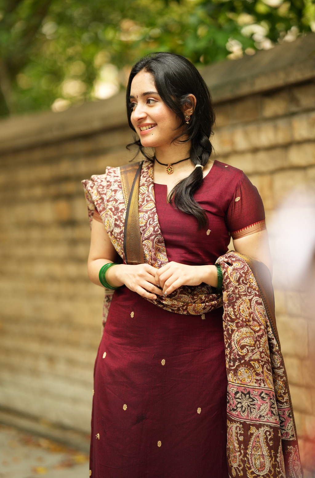 Elegant maroon Narayanpet handloom suit with festive ethnic styling and traditional Indian weave texture