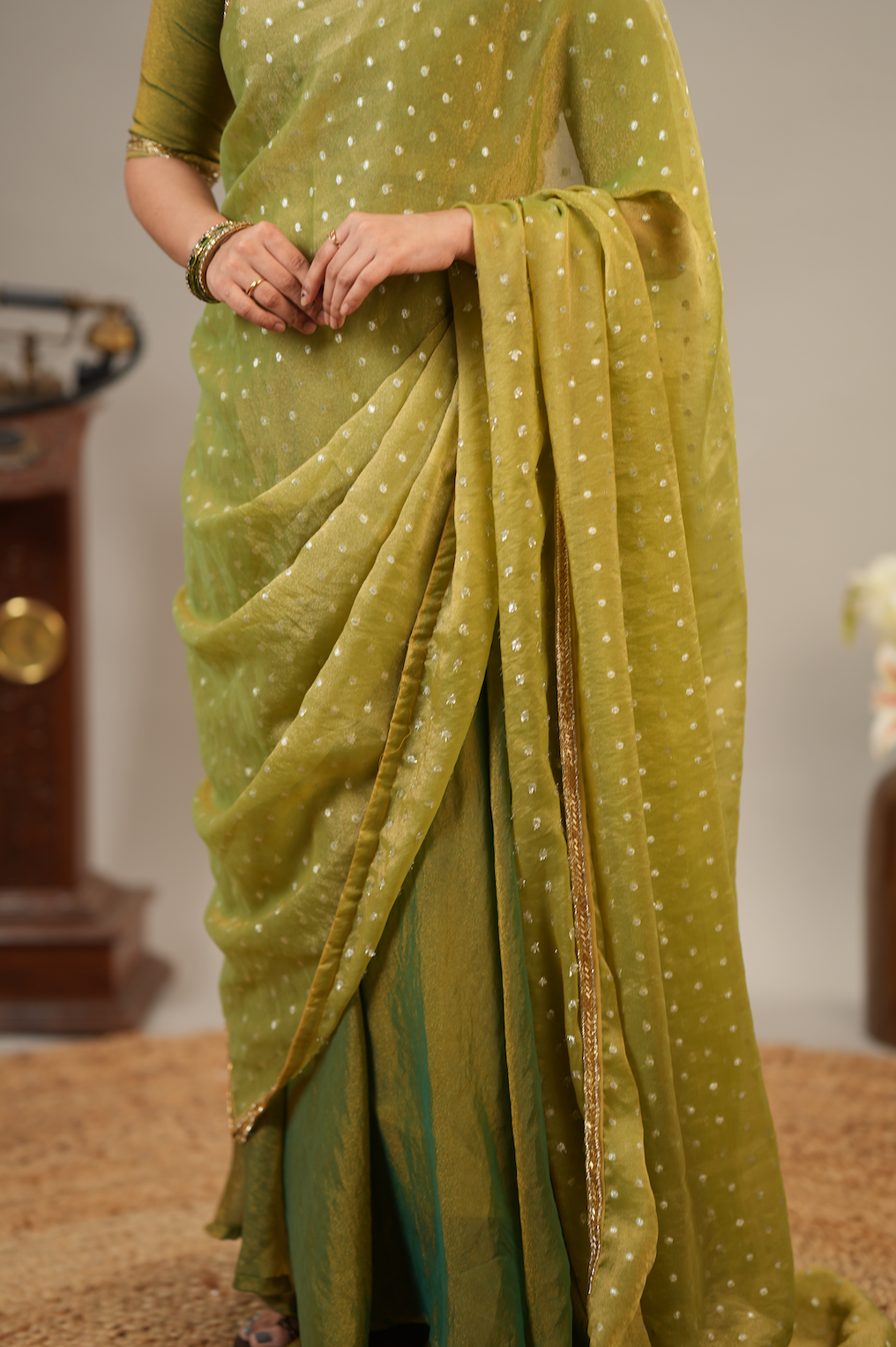 Heavy embroidered dupatta border paired with mehendi green tissue silk festive ethnic wear for women
