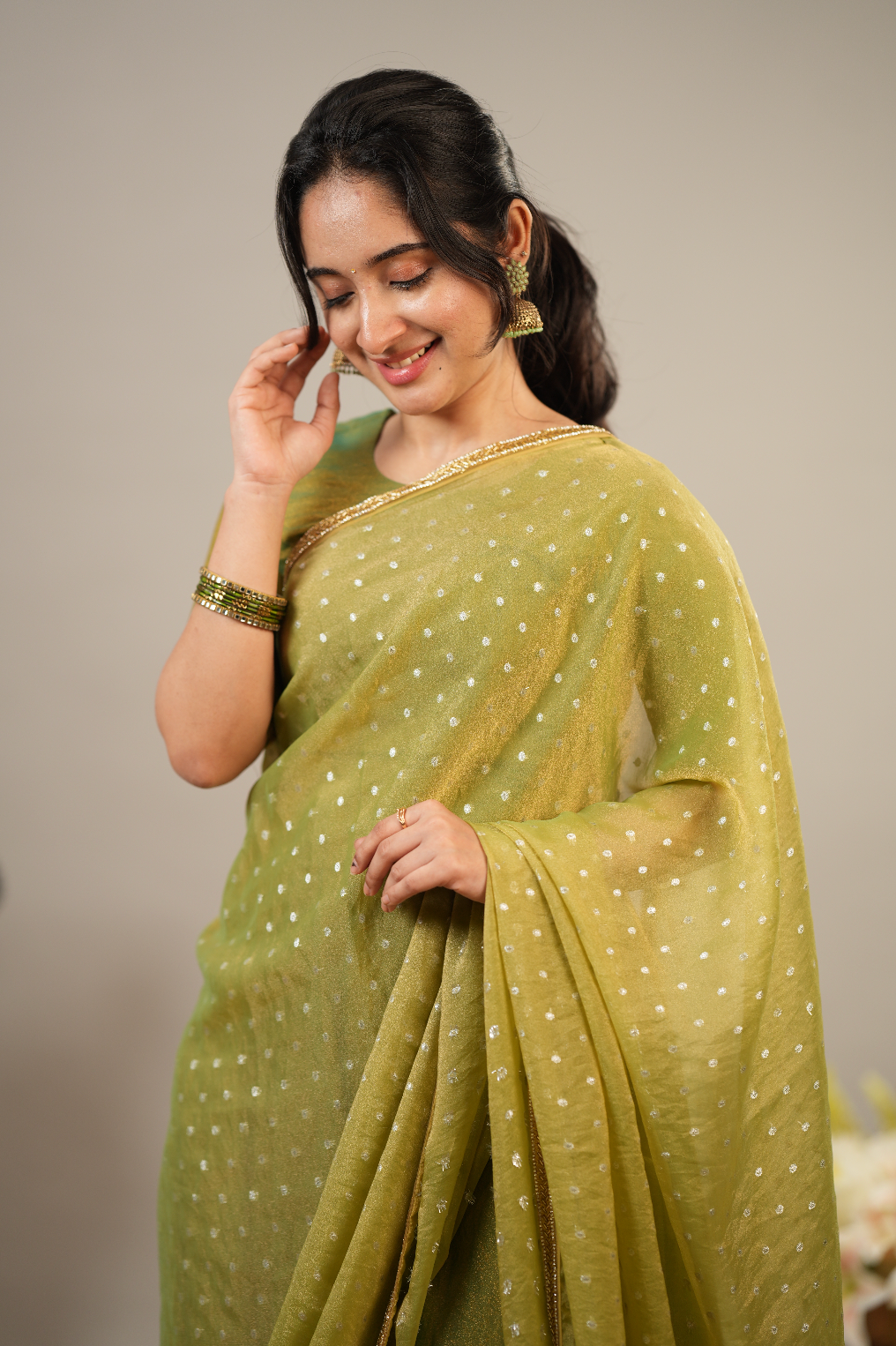 Women’s festive tissue silk outfit with elegant sharara styling and premium ethnic embroidery detailing