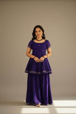 Royal purple kurta and Sharara set for women featuring a matching dupatta, traditional handloom weave, and graceful festive styling.