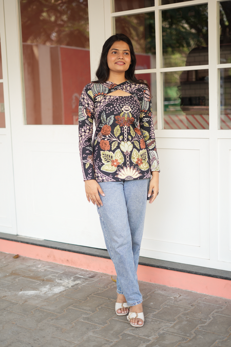 Relaxed pose in Jaipur cotton short Kurti – dark floral Indian ethnic top with full sleeve border detail