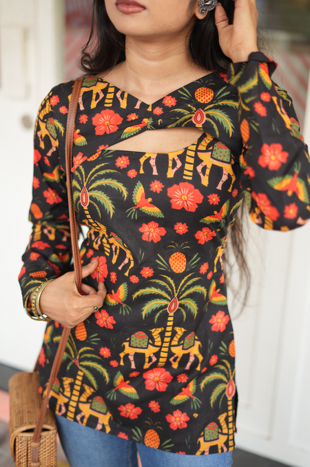 Close-up of keyhole cut neckline on Jaipuri block print cotton Kurti – zigzag adjustment knots detail
