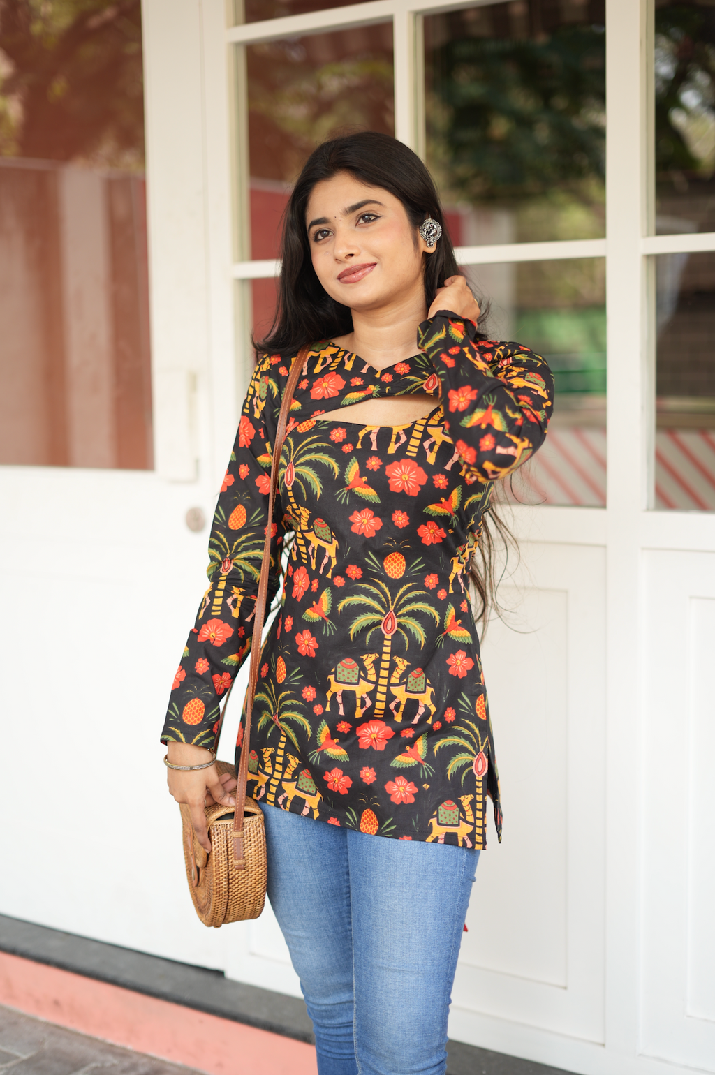 Torso close-up of dark Jaipuri block print Kurti – elephant and marigold folk motifs on prewashed cotton fabric