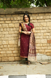 Maroon Narayanpet handloom suit set with printed Kalamkari dupatta and elegant festive ethnic styling