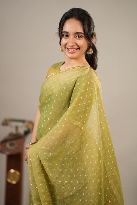 Mehendi green tissue silk festive sharara set with elegant embroidered dupatta and traditional ethnic styling
