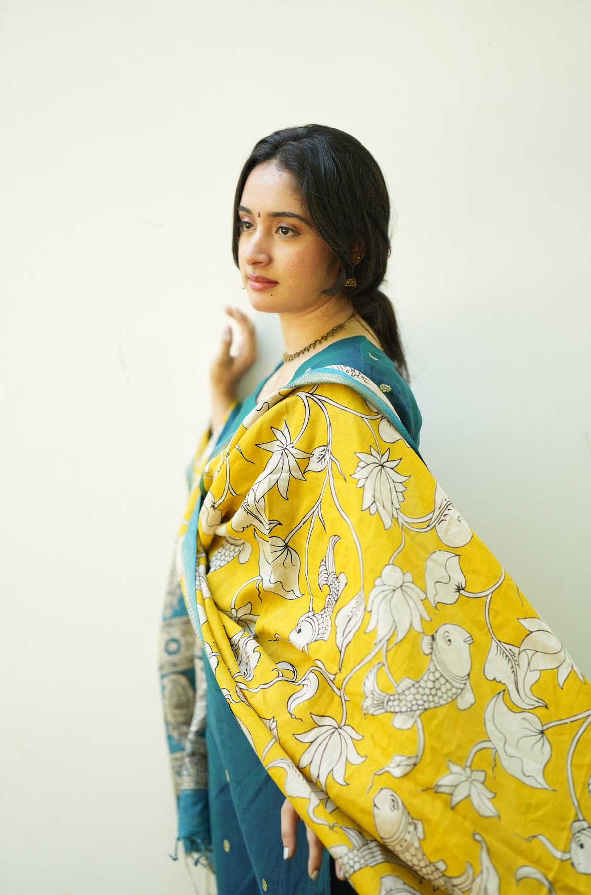 Women’s Narayanpet handloom kurta set with yellow Kalamkari dupatta and traditional ethnic styling