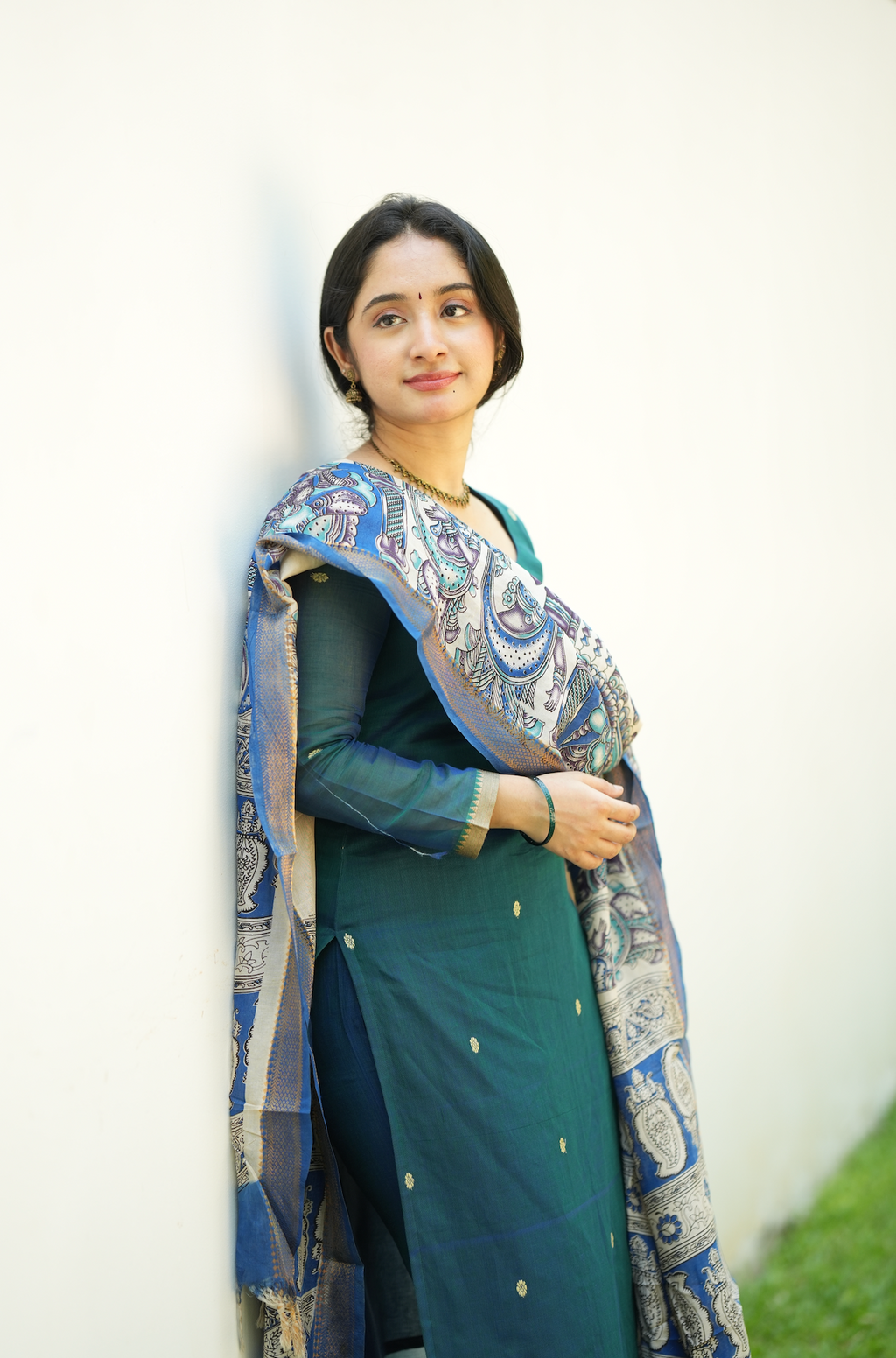 Elegant peacock blue ethnic outfit with handloom kurta and festive Kalamkari dupatta drape