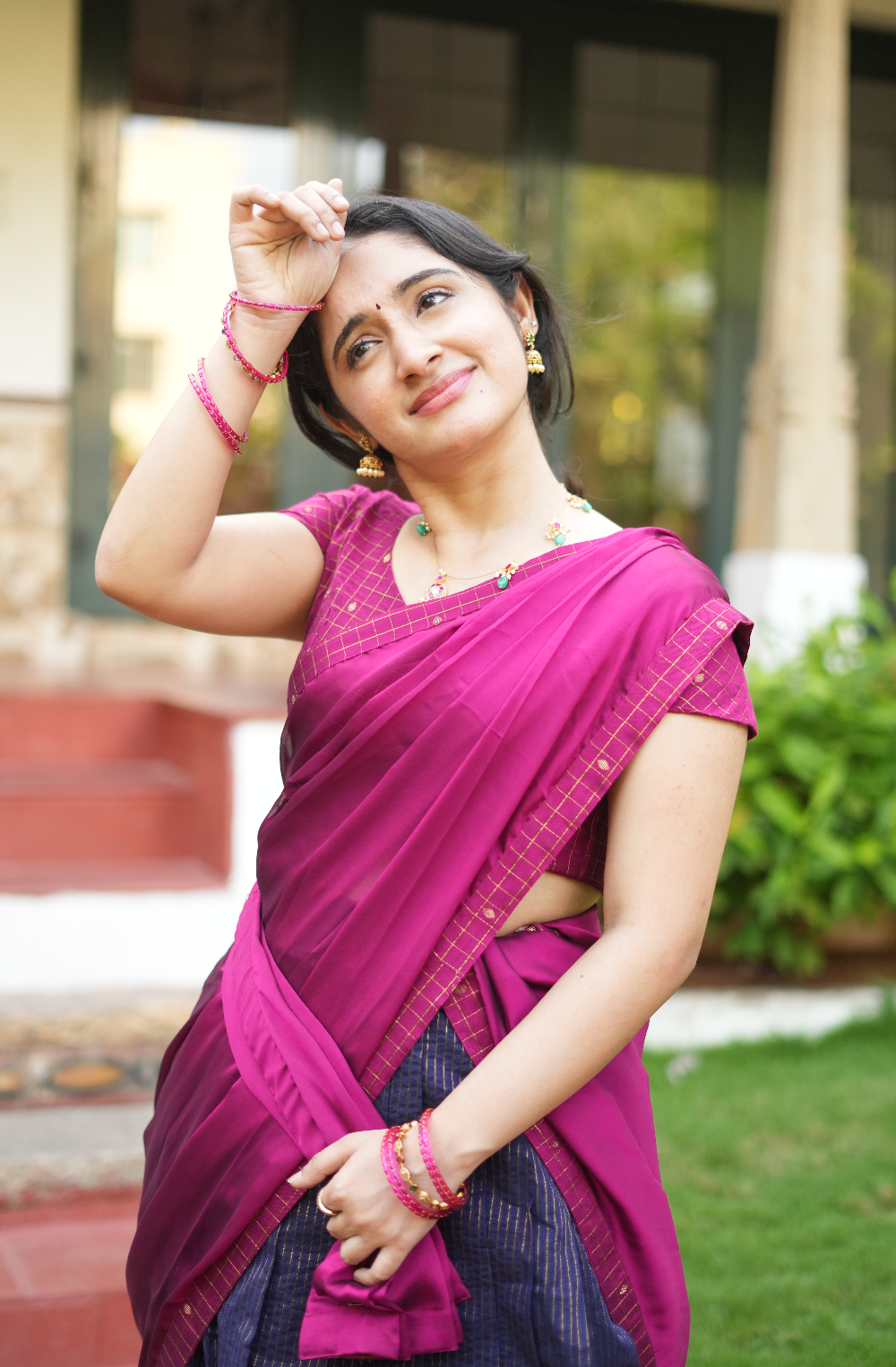 Plum Chettinad dhavani blouse with soft georgette drape close-up portrait