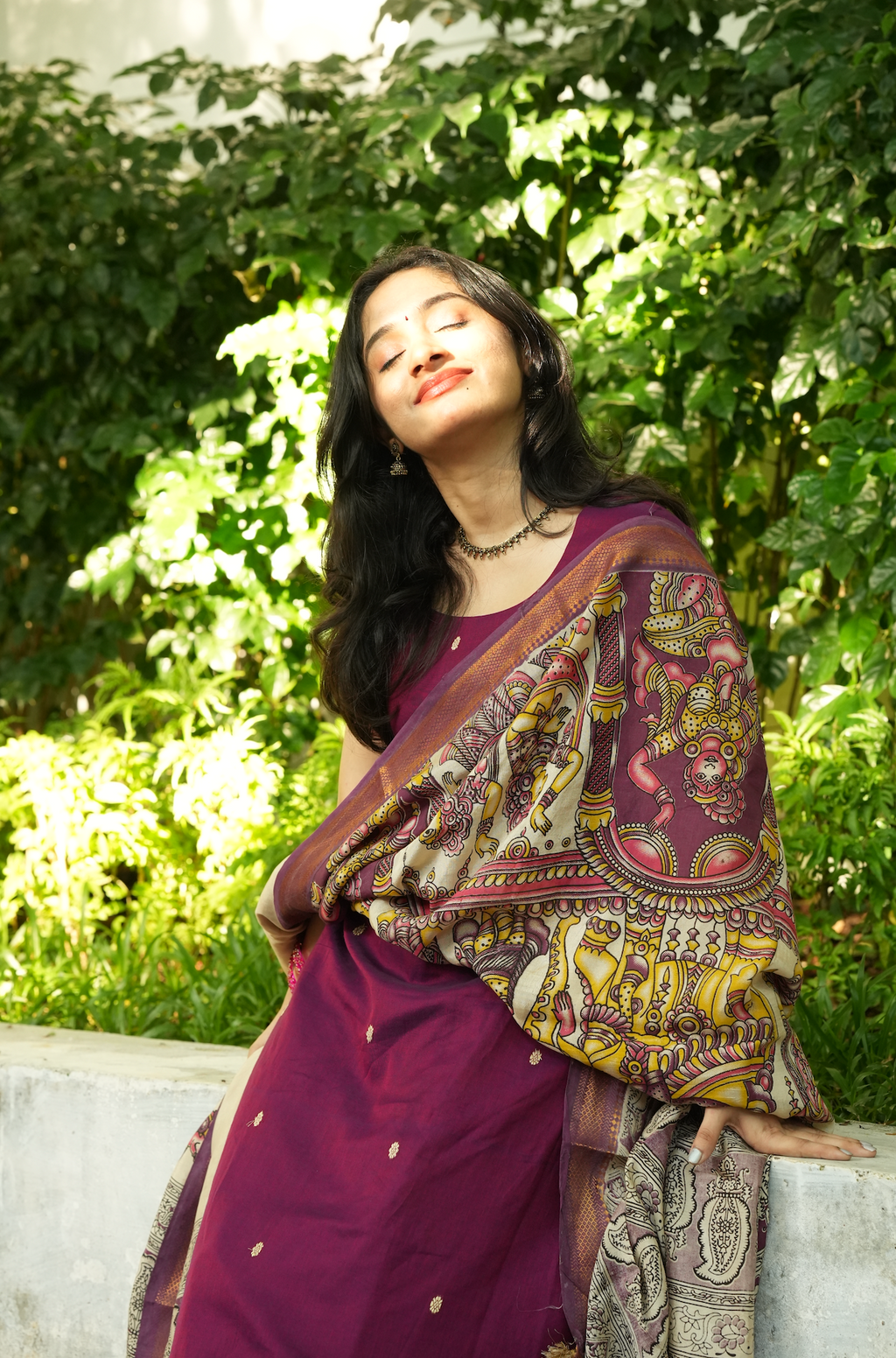 Elegant plum ethnic handloom wear with traditional Kalamkari dupatta and festive Indian styling