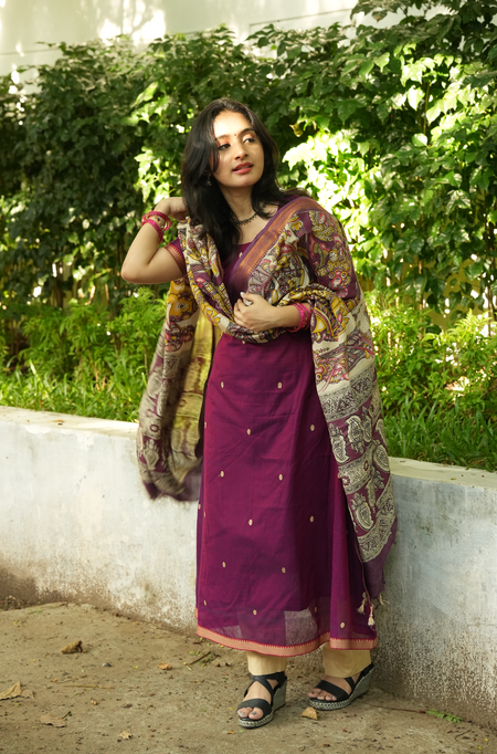 Women’s plum Narayanpet handloom outfit with functional pockets and elegant ethnic festive styling