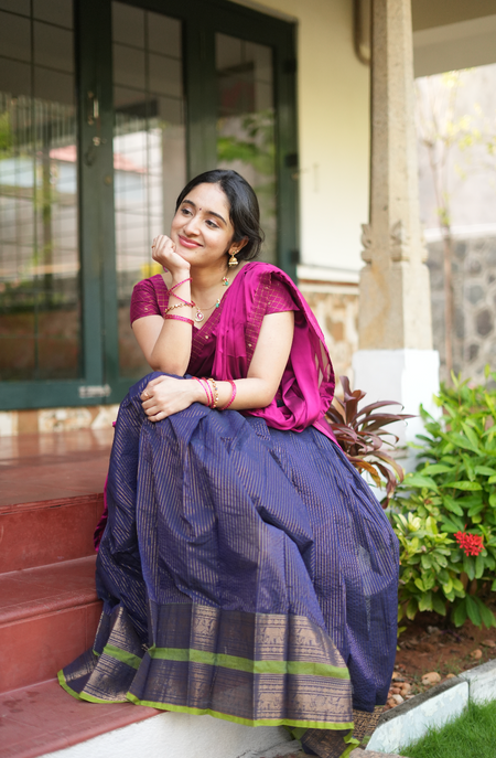 Traditional South Indian dhavani outfit in plum and navy handloom fabric