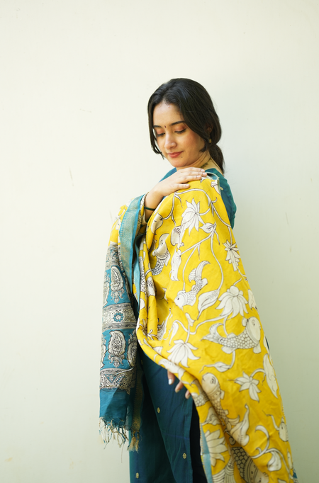 Elegant teal blue ethnic outfit with Narayanpet handloom fabric and festive dupatta styling for women
