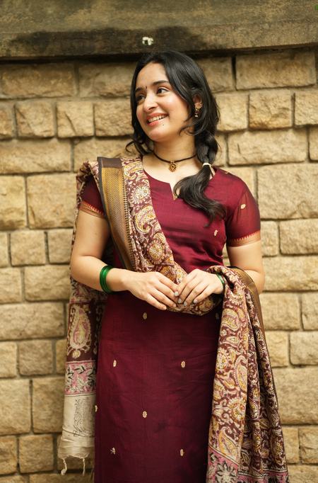 Women’s festive tissue silk outfit with elegant sharara styling and premium ethnic embroidery detailing