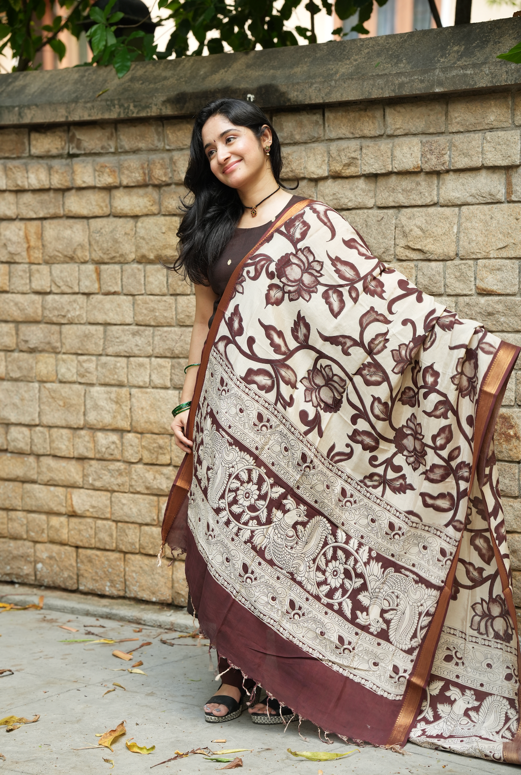 Traditional Indian handloom suit with detailed pen Kalamkari dupatta and coffee brown ethnic silhouette